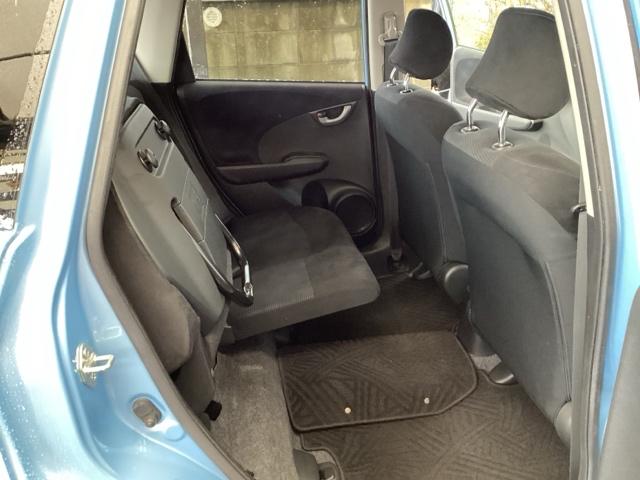 フィット 13G・スマートセレクションファインスタイル 純正メモリーナビ オートエアコン ETC USB 記録簿有り 盗難防止装置 キーレス パワーウィンドウ インテリキー ワンセグTV DVD再生 パワーステアリング ABS エアバック ナビ・TV(56枚目)