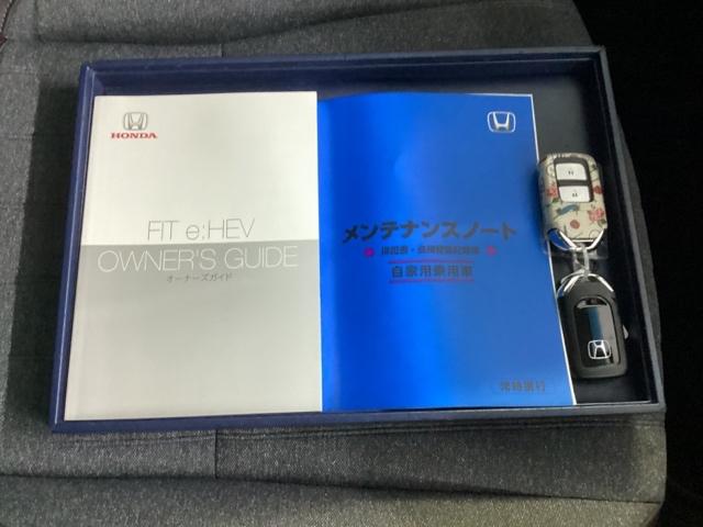 フィット e:HEVホーム20周年特別仕様車カーサ メモリーナビ ドラレコ リアカメラ DVD シートヒーター 横滑り防止装置 フルセグ LEDヘッドライト ドライブレコーダー スマキー オートクルーズコントロール サイドエアバック 記録簿 AAC(21枚目)