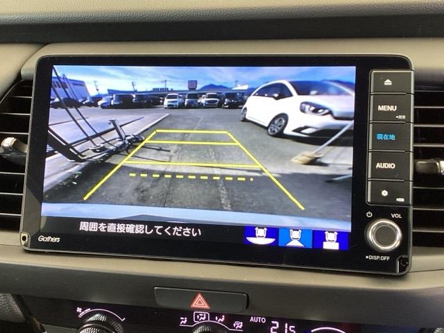 フィット e:HEVホーム 純正メモリーナビ ドラレコ リアカメラ 前後誤発進抑制機能 クリソナ 助手席エアバッグ 運転席エアバッグ アイドリングストップ LEDライト USB接続 バックカメラ ABS サイドエアバッグ 記録簿(12枚目)