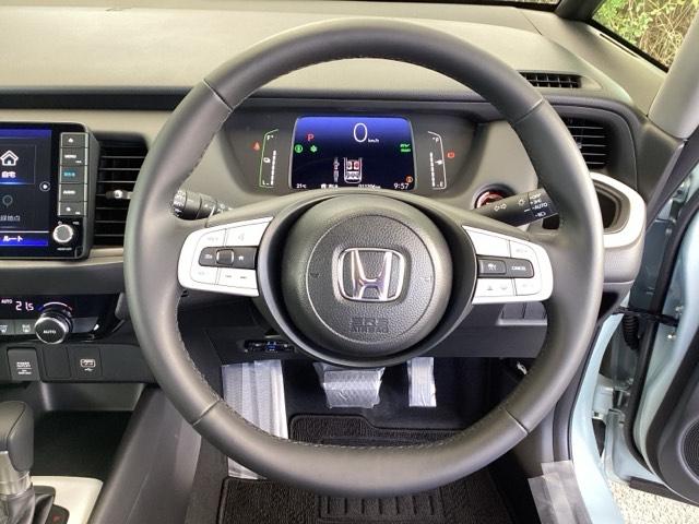 フィット e:HEVホーム 純正メモリーナビ ドラレコ リアカメラ 前後誤発進抑制機能 クリソナ 助手席エアバッグ 運転席エアバッグ アイドリングストップ LEDライト USB接続 バックカメラ ABS サイドエアバッグ 記録簿(14枚目)