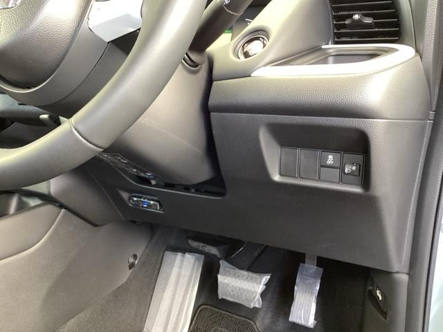 フィット e:HEVホーム 純正メモリーナビ ドラレコ リアカメラ 前後誤発進抑制機能 クリソナ 助手席エアバッグ 運転席エアバッグ アイドリングストップ LEDライト USB接続 バックカメラ ABS サイドエアバッグ 記録簿(15枚目)