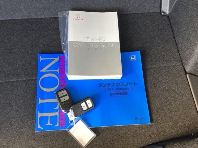 フィット e:HEVホーム 純正メモリーナビ ドラレコ リアカメラ 前後誤発進抑制機能 クリソナ 助手席エアバッグ 運転席エアバッグ アイドリングストップ LEDライト USB接続 バックカメラ ABS サイドエアバッグ 記録簿(19枚目)