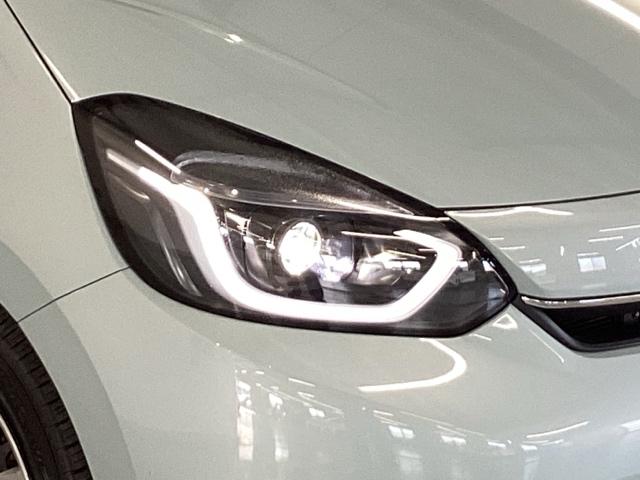 フィット e:HEVホーム 純正メモリーナビ ドラレコ リアカメラ 前後誤発進抑制機能 クリソナ 助手席エアバッグ 運転席エアバッグ アイドリングストップ LEDライト USB接続 バックカメラ ABS サイドエアバッグ 記録簿(22枚目)