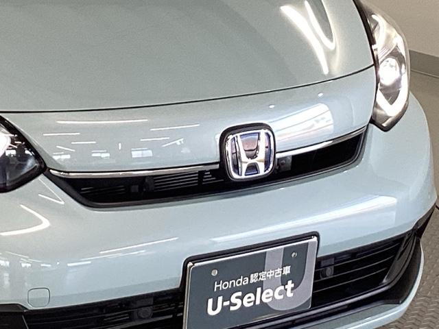 フィット e:HEVホーム 純正メモリーナビ ドラレコ リアカメラ 前後誤発進抑制機能 クリソナ 助手席エアバッグ 運転席エアバッグ アイドリングストップ LEDライト USB接続 バックカメラ ABS サイドエアバッグ 記録簿(23枚目)