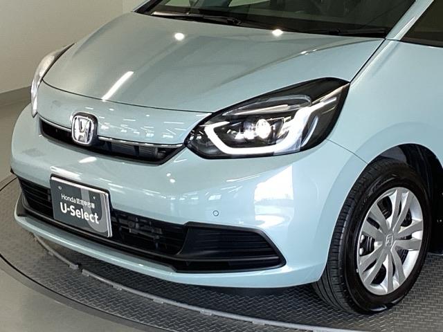 フィット e:HEVホーム 純正メモリーナビ ドラレコ リアカメラ 前後誤発進抑制機能 クリソナ 助手席エアバッグ 運転席エアバッグ アイドリングストップ LEDライト USB接続 バックカメラ ABS サイドエアバッグ 記録簿(24枚目)