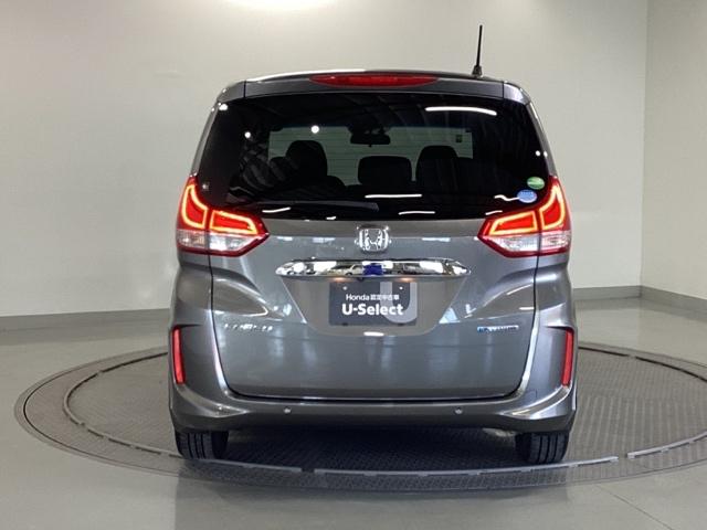 フリードハイブリッド ハイブリッド・Gホンダセンシング メモリーナビ ドラレコ ETC リアカメラ 軽減ブレーキ キーフリーシステム DVD再生可能 ECON 禁煙 後カメラ Aクルーズ 地デジフルセグTV LEDヘッドランプ シートH 横滑防止 USB(10枚目)