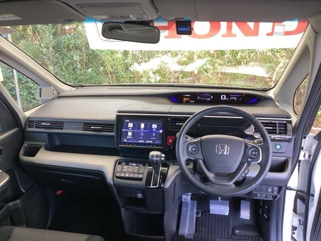 ステップワゴンスパーダ スパーダホンダセンシング 純正メモリーナビ 両側電動スライドドア 盗難防止 助手席エアバッグ Wパワスラ 記録簿有 地デジ サイドエアバッグ LEDライト 横滑り防止システム オートエアコン リアカメラ ナビ&TV 三列シート(2枚目)