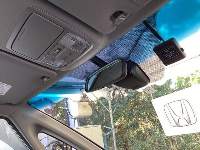 ステップワゴンスパーダ スパーダホンダセンシング 純正メモリーナビ 両側電動スライドドア 盗難防止 助手席エアバッグ Wパワスラ 記録簿有 地デジ サイドエアバッグ LEDライト 横滑り防止システム オートエアコン リアカメラ ナビ&TV 三列シート(10枚目)