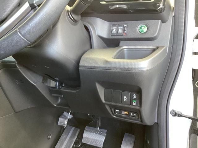 ステップワゴンスパーダ スパーダホンダセンシング 純正メモリーナビ 両側電動スライドドア 盗難防止 助手席エアバッグ Wパワスラ 記録簿有 地デジ サイドエアバッグ LEDライト 横滑り防止システム オートエアコン リアカメラ ナビ&TV 三列シート(15枚目)