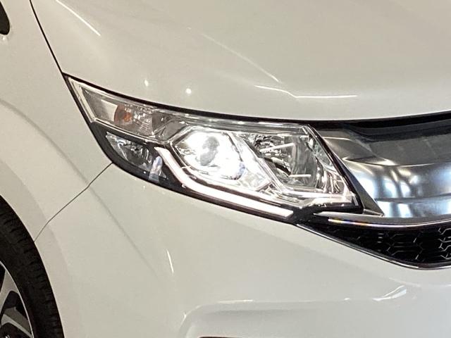 ステップワゴンスパーダ スパーダホンダセンシング 純正メモリーナビ 両側電動スライドドア 盗難防止 助手席エアバッグ Wパワスラ 記録簿有 地デジ サイドエアバッグ LEDライト 横滑り防止システム オートエアコン リアカメラ ナビ&TV 三列シート(23枚目)