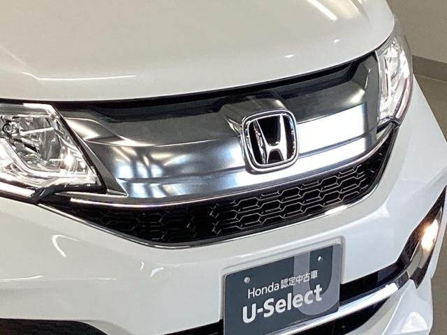 ステップワゴンスパーダ スパーダホンダセンシング 純正メモリーナビ 両側電動スライドドア 盗難防止 助手席エアバッグ Wパワスラ 記録簿有 地デジ サイドエアバッグ LEDライト 横滑り防止システム オートエアコン リアカメラ ナビ&TV 三列シート(24枚目)