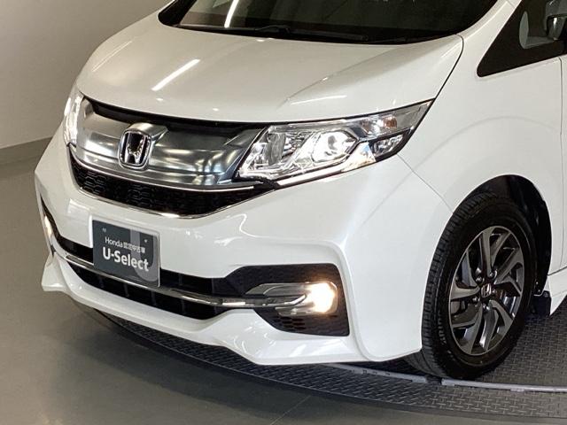 ステップワゴンスパーダ スパーダホンダセンシング 純正メモリーナビ 両側電動スライドドア 盗難防止 助手席エアバッグ Wパワスラ 記録簿有 地デジ サイドエアバッグ LEDライト 横滑り防止システム オートエアコン リアカメラ ナビ&TV 三列シート(26枚目)