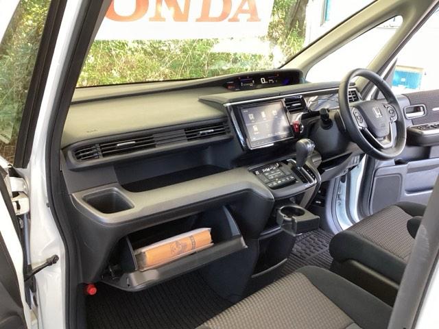 ステップワゴンスパーダ スパーダホンダセンシング 純正メモリーナビ 両側電動スライドドア 盗難防止 助手席エアバッグ Wパワスラ 記録簿有 地デジ サイドエアバッグ LEDライト 横滑り防止システム オートエアコン リアカメラ ナビ&TV 三列シート(36枚目)