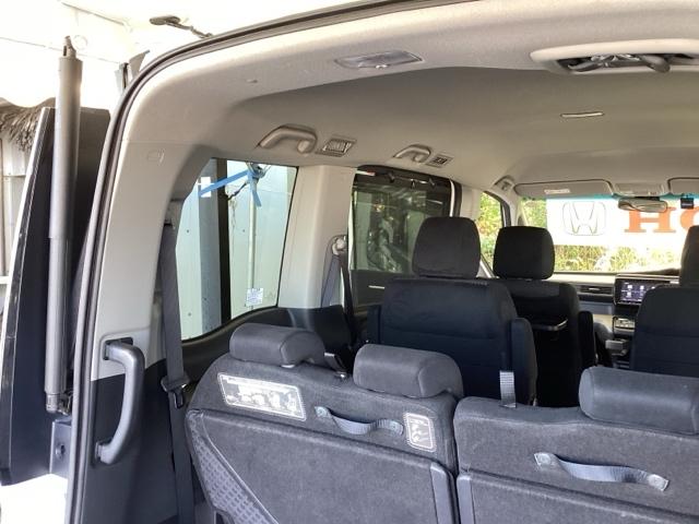 ステップワゴンスパーダ スパーダホンダセンシング 純正メモリーナビ 両側電動スライドドア 盗難防止 助手席エアバッグ Wパワスラ 記録簿有 地デジ サイドエアバッグ LEDライト 横滑り防止システム オートエアコン リアカメラ ナビ&TV 三列シート(64枚目)
