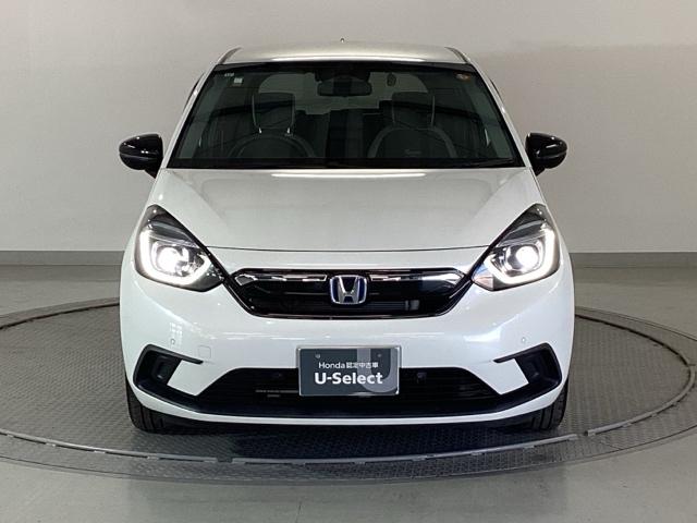 フィット ｅ：ＨＥＶホーム２０周年特別仕様車メゾン　純正メモリーナビ　ドラレコ　リアカメラ　誤発信抑制　Ｐセンサー　Ｒカメ　フルセグ　ＥＴＣ　ＡＢＳ　シートヒーター　オートクルーズコントロール　横滑り防止装置　サイドカーテンエアバック　ＬＥＤ　イモビ（6枚目）