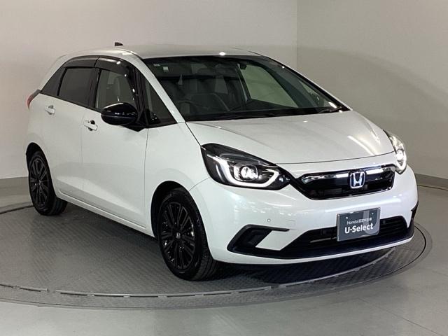 フィット ｅ：ＨＥＶホーム２０周年特別仕様車メゾン　純正メモリーナビ　ドラレコ　リアカメラ　誤発信抑制　Ｐセンサー　Ｒカメ　フルセグ　ＥＴＣ　ＡＢＳ　シートヒーター　オートクルーズコントロール　横滑り防止装置　サイドカーテンエアバック　ＬＥＤ　イモビ（7枚目）