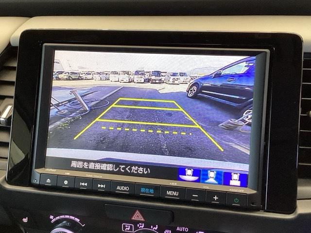 フィット ｅ：ＨＥＶホーム２０周年特別仕様車メゾン　純正メモリーナビ　ドラレコ　リアカメラ　誤発信抑制　Ｐセンサー　Ｒカメ　フルセグ　ＥＴＣ　ＡＢＳ　シートヒーター　オートクルーズコントロール　横滑り防止装置　サイドカーテンエアバック　ＬＥＤ　イモビ（12枚目）