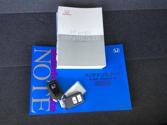 フィット ｅ：ＨＥＶホーム２０周年特別仕様車メゾン　純正メモリーナビ　ドラレコ　リアカメラ　誤発信抑制　Ｐセンサー　Ｒカメ　フルセグ　ＥＴＣ　ＡＢＳ　シートヒーター　オートクルーズコントロール　横滑り防止装置　サイドカーテンエアバック　ＬＥＤ　イモビ（19枚目）