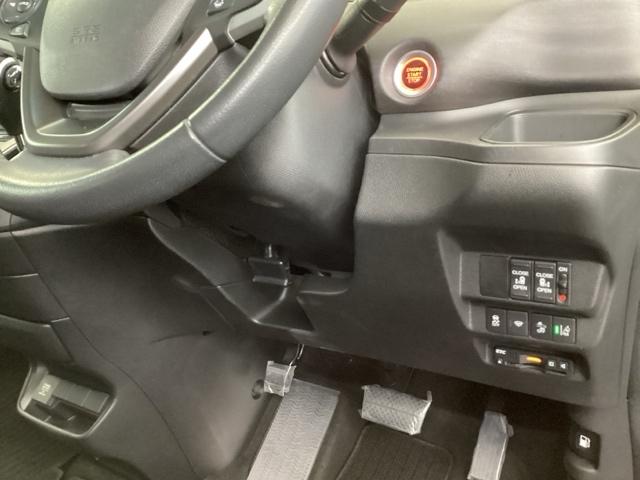 フリード Ｇ・ホンダセンシング　純正メモリーナビ　両側電動スライドドア　スマートキーＰスタート　盗難防止システム　横滑防止装置　ＬＥＤランプ　ナビＴＶ　記録簿　リアカメ　クルコン　パワーウインド　ウォークスルー　ＤＶＤ再生機能（15枚目）