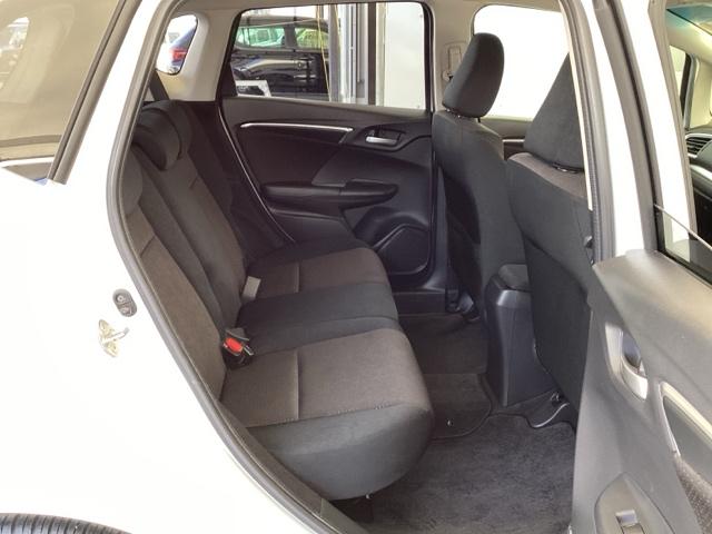 フィットハイブリッド Fパッケージ メモリーナビ オートエアコン ETC イモビライザー スマキー 運転席助手席エアバッグ ナビTV ECONモード 横滑り防止機能 キーレス 運転席エアバッグ USB ABS DVD視聴 ワンセグ(16枚目)