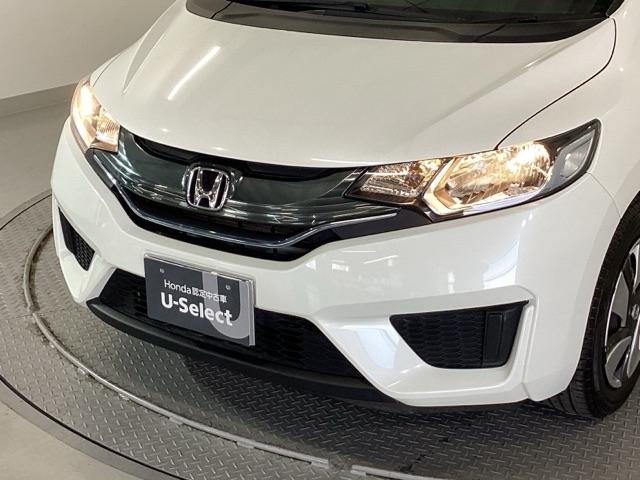 フィットハイブリッド Fパッケージ メモリーナビ オートエアコン ETC イモビライザー スマキー 運転席助手席エアバッグ ナビTV ECONモード 横滑り防止機能 キーレス 運転席エアバッグ USB ABS DVD視聴 ワンセグ(24枚目)