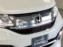 スパーダホンダセンシング 純正メモリーナビ 両側電動スライドドア 盗難防止 助手席エアバッグ Wパワスラ 記録簿有 地デジ サイドエアバッグ LEDライト 横滑り防止システム オートエアコン リアカメラ ナビ&TV 三列シート(24枚目)