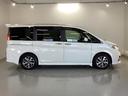 スパーダホンダセンシング 純正メモリーナビ 両側電動スライドドア 盗難防止 助手席エアバッグ Wパワスラ 記録簿有 地デジ サイドエアバッグ LEDライト 横滑り防止システム オートエアコン リアカメラ ナビ&TV 三列シート(33枚目)