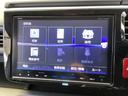 スパーダホンダセンシング 純正メモリーナビ 両側電動スライドドア 盗難防止 助手席エアバッグ Wパワスラ 記録簿有 地デジ サイドエアバッグ LEDライト 横滑り防止システム オートエアコン リアカメラ ナビ&TV 三列シート(37枚目)