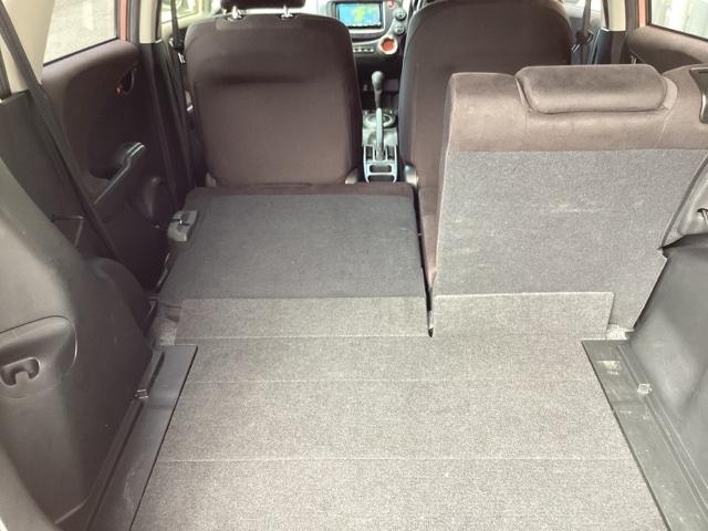 フィット シーズファインスタイル ETC/社外ナビ フルセグ Wエアバッグ パワーウィンドウ 盗難防止装置 DVD キーフリー 記録簿 エアコン スマートキー エアバック ナビTV ABS パワーステアリング(42枚目)