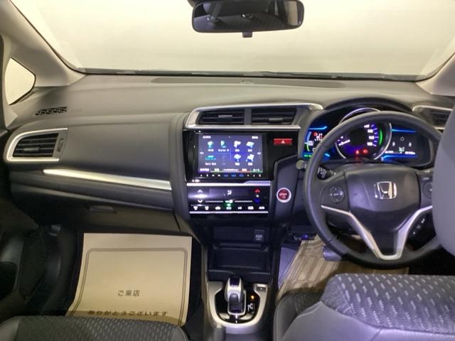 フィットハイブリッド Lパッケージ メモリーナビ ETC リアカメラ ナビ&TV 地デジフルセグTV サイドエアバック DVD再生 LED ECON バックカメラ オートクルーズコントロール イモビライザー ESC AUTOエアコン(2枚目)