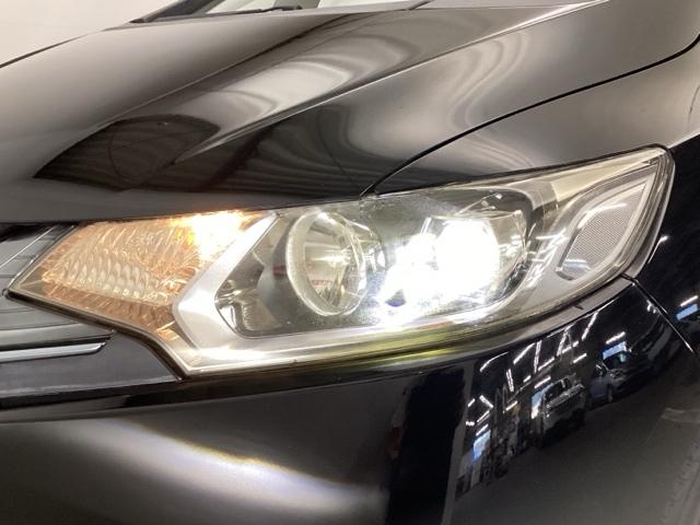 フィットハイブリッド Lパッケージ メモリーナビ ETC リアカメラ ナビ&TV 地デジフルセグTV サイドエアバック DVD再生 LED ECON バックカメラ オートクルーズコントロール イモビライザー ESC AUTOエアコン(26枚目)