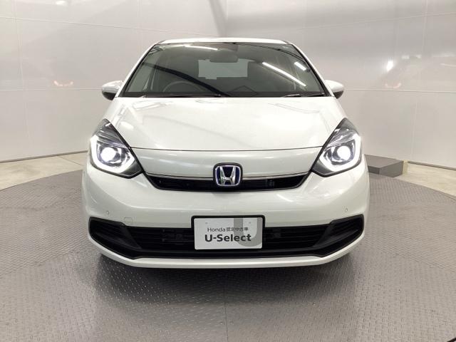 フィット ｅ：ＨＥＶホーム　リアカメラ　ＥＴＣ　前後誤発進抑制機能　クリソナ　助手席エアバッグ　運転席エアバッグ　アイドリングストップ　ＬＥＤライト　バックカメラ　ＡＢＳ　サイドエアバッグ　オートクルーズコントロール　ＤＶＤ再生（6枚目）