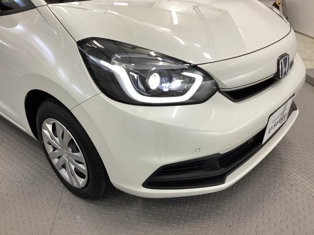 フィット ｅ：ＨＥＶホーム　リアカメラ　ＥＴＣ　前後誤発進抑制機能　クリソナ　助手席エアバッグ　運転席エアバッグ　アイドリングストップ　ＬＥＤライト　バックカメラ　ＡＢＳ　サイドエアバッグ　オートクルーズコントロール　ＤＶＤ再生（20枚目）