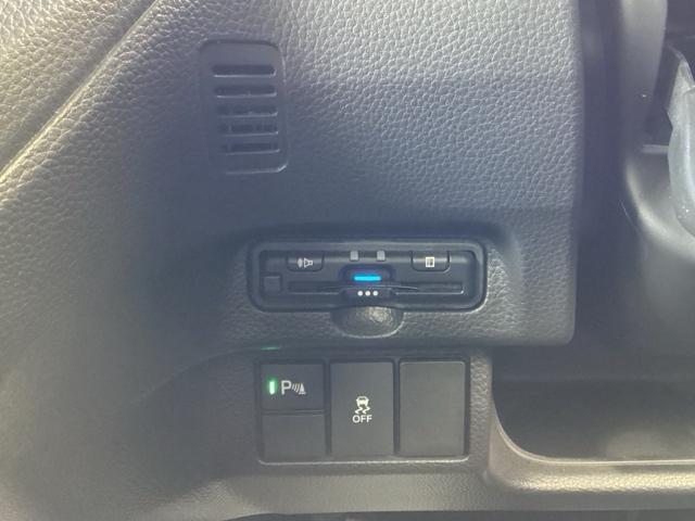 N-BOXカスタム G・Lターボホンダセンシング プラズマクラスター技術搭載フルオート・エアコンディショナー ターボ付 横滑り防止機能 ETC搭載 Sヒーター LEDヘットライト ABS 地デジ DVD視聴可能 セキュリティアラーム ナビTV付 PS(14枚目)