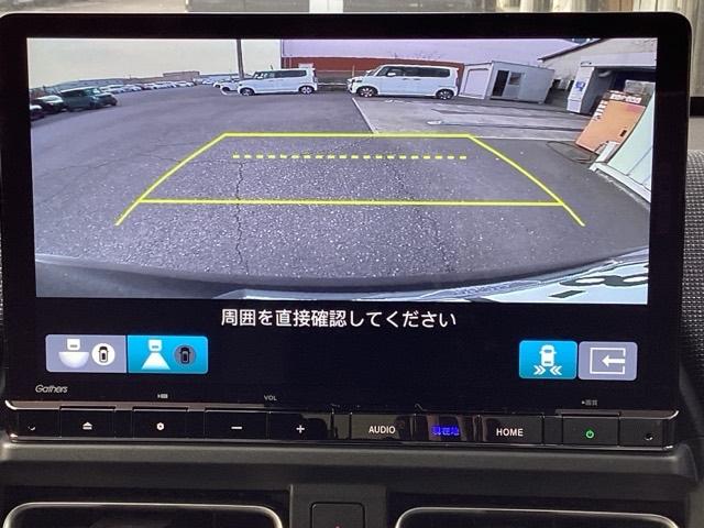 フリード ｅ：ＨＥＶエアーＥＸ　ＥＴＣ／純正ナビ／バックモニター／ホンダセンシング／全周囲カメラ　セキュリティアラーム　両側電動パワースライドドア　横滑り防止　エアコン　ＤＶＤ再生可　クルコン　誤発進抑制機能　ナビ＆ＴＶ　三列シート（12枚目）