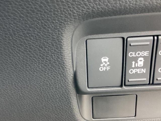 フリード ｅ：ＨＥＶエアーＥＸ　ＥＴＣ／純正ナビ／バックモニター／ホンダセンシング／全周囲カメラ　セキュリティアラーム　両側電動パワースライドドア　横滑り防止　エアコン　ＤＶＤ再生可　クルコン　誤発進抑制機能　ナビ＆ＴＶ　三列シート（31枚目）