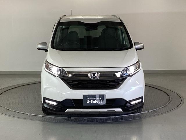 フリード+ハイブリッド ハイブリッド・クロスターホンダセンシング 純正メモリーナビ 両側電動スライドドア Bカメラ LED ETC フルセグTV オートエアコン ウォークスルー クルーズコントロール 横滑り防止装置 USB キーフリー 盗難防止装置 スマートキー(6枚目)