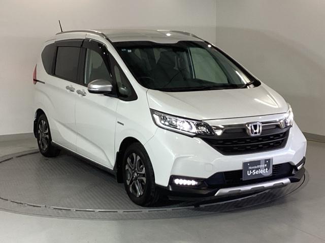 フリード+ハイブリッド ハイブリッド・クロスターホンダセンシング 純正メモリーナビ 両側電動スライドドア Bカメラ LED ETC フルセグTV オートエアコン ウォークスルー クルーズコントロール 横滑り防止装置 USB キーフリー 盗難防止装置 スマートキー(7枚目)