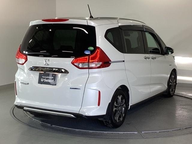 フリード+ハイブリッド ハイブリッド・クロスターホンダセンシング 純正メモリーナビ 両側電動スライドドア Bカメラ LED ETC フルセグTV オートエアコン ウォークスルー クルーズコントロール 横滑り防止装置 USB キーフリー 盗難防止装置 スマートキー(8枚目)