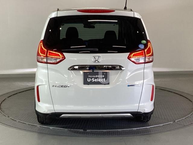 フリード+ハイブリッド ハイブリッド・クロスターホンダセンシング 純正メモリーナビ 両側電動スライドドア Bカメラ LED ETC フルセグTV オートエアコン ウォークスルー クルーズコントロール 横滑り防止装置 USB キーフリー 盗難防止装置 スマートキー(9枚目)