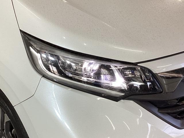 フリード+ハイブリッド ハイブリッド・クロスターホンダセンシング 純正メモリーナビ 両側電動スライドドア Bカメラ LED ETC フルセグTV オートエアコン ウォークスルー クルーズコントロール 横滑り防止装置 USB キーフリー 盗難防止装置 スマートキー(22枚目)