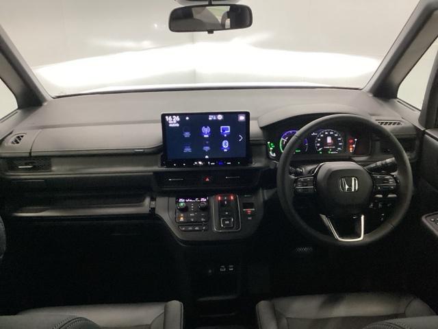 ステップワゴン e:HEVスパーダ 禁煙車 メモリーナビ リアカメラ 両側電動スライドドア 地デジチューナー 前後障害物センサー 両側オートスライドドア 前後誤発進抑制 VSA サイドエアバッグ DVD再生 パワーウィンドウ 3列シート(2枚目)