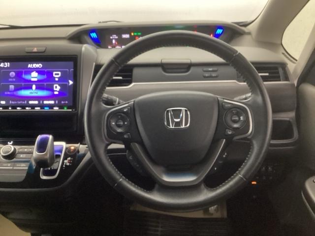 フリードハイブリッド ハイブリッド・Gホンダセンシング リアカメラ ドラレコ ETC スマキ- 両Pスラドア Dレコ Aクルコン LEDヘットランプ 整備記録簿 ナビTV Bカメラ フルセグ地デジ アイストップ 助手席エアバッグ DVD再生 横滑り防止機能(3枚目)