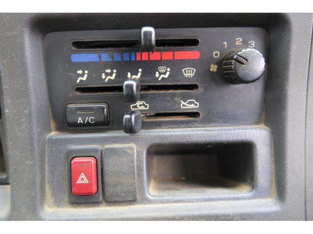 サンバートラック ＴＢ　セレクト４ＷＤ車　エアコン　パワーステアリング　エアバッグ　荷台ガード　ラジオ　ライトレベル調節　記録簿　５速ミッション（20枚目）