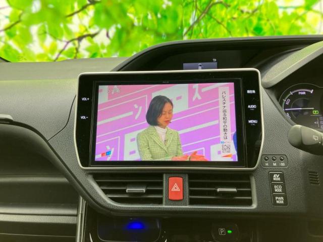 ノア ハイブリッドＳｉ　純正エアロ／保証書／純正　１０インチ　ＳＤナビ／フリップダウンモニター　純正　１２．８インチ／衝突安全装置／両側電動スライドドア／車線逸脱防止支援システム／ヘッドランプ　ＬＥＤ　衝突被害軽減システム（13枚目）