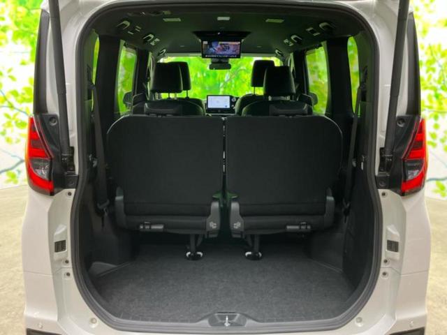 ノア ハイブリッドＳ－Ｚ　保証書／純正　１０インチ　ＳＤナビ／フリップダウンモニター／衝突安全装置／両側電動スライドドア／シートヒーター／車線逸脱防止支援システム／シート　ハーフレザー／電動バックドア／ヘッドランプ　ＬＥＤ（20枚目）