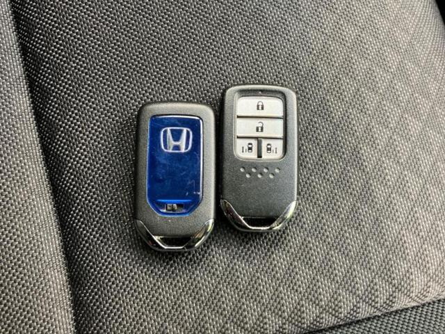 フリード+ハイブリッド ハイブリッドGホンダセンシング 社外 ナビ/ホンダセンシング/両側電動スライドドア/車線逸脱防止支援システム/ドライブレコーダー 社外/Bluetooth接続/ETC/EBD付ABS/横滑り防止装置/アイドリングストップ DVD再生(32枚目)