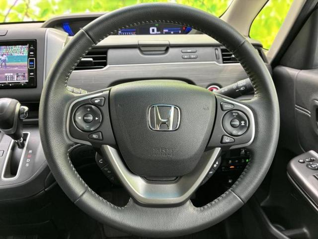 フリード Ｇホンダセンシング　新品タイヤ／保証書／純正　ナビ／ホンダセンシング／両側電動スライドドア／シートヒーター　前席／車線逸脱防止支援システム／シート　ハーフレザー／ドライブレコーダー　前後／ヘッドランプ　ＬＥＤ　ＤＶＤ再生（15枚目）