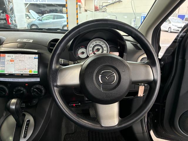 デミオ １３Ｃスマートエディション　ＥＴＣ　バックカメラ　ナビ　ワンセグ　キーレスエントリー　電動格納ミラー　ＡＴ　衝突安全ボディ　ＡＢＳ　ＣＤ　エアコン　パワーステアリング　レンタＵＰ（3枚目）