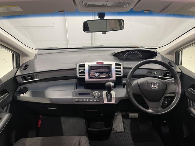 フリード 　１．５Ｇ　福祉車両・助手席リフトＵＰシート・６人乗・走行１６千Ｋ・左電動スライドドア・ＣＤオーディオ・左右スライドドア・キーレス・リモコン・折り畳み車イス固定ネット・左右ＳＤ・純正ＨＩＤヘッドライト（29枚目）